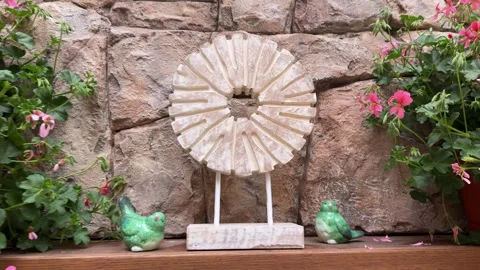 Pink Floral Decor on Rustic Stone Fireplace Mantel in Luxury Gazebo Vídeo Stock 334885257