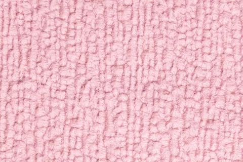 Pink fluffy background of soft, fleecy cloth. Texture of textile closeup Stock Photos