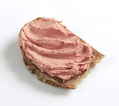Pink frosting on bread slice Stock Photos