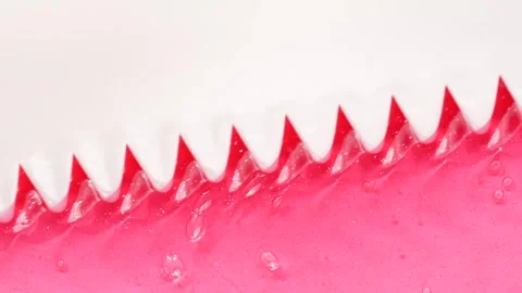 Pink gel flow texture. Liquid gel moisturizer with bubbles macro. Abstract .. Stock Footage 309937402