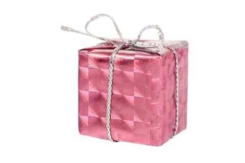 Pink gift box with a gray string on a white background isolate. Holiday conce Stock Photos
