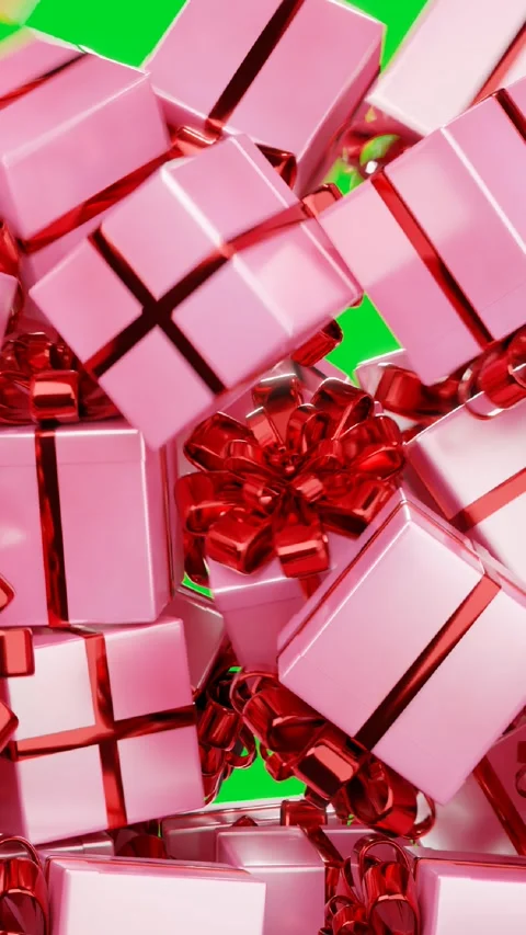 Pink gift boxes with ribbons fall, covering the entire green screen. Transition Stock Footage 262769292