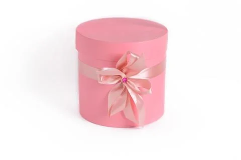 Pink gift boxes in round shape isolated on white background Stock Photos