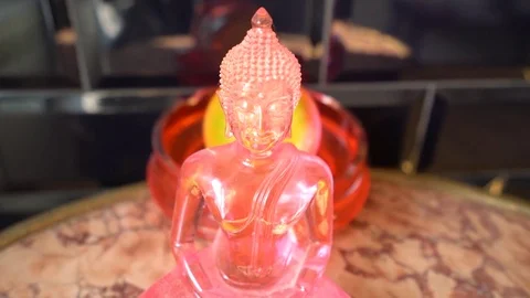 Pink glass Buddha statue Stock-Footage 75650832