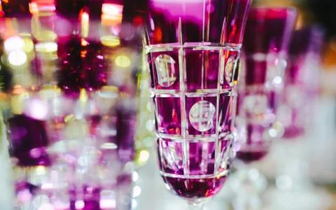 Pink glasses in a row - texture with light behind Stock Photos
