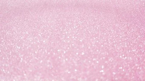 Pink glitter for an abstract background, selective focus. Stock Photos