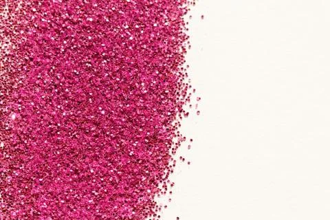 Pink glitter on light background - macro photo Stock Photos