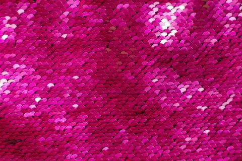 Pink glittering texture background from sequins. Stock Photos