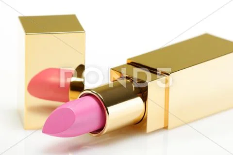 Pink golden lipstick over white Stock Photos