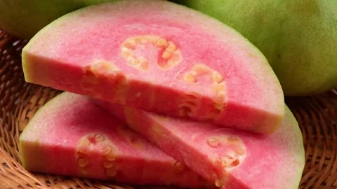 Pink guava in a basket Stock Footage 335024816