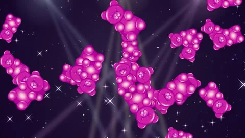 Pink Gummy Bears Floating Over Sparkling Glitter and Light Rays Stock Footage 345038012