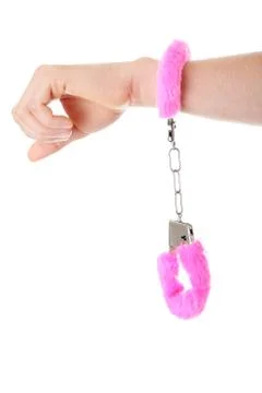 Pink handcuff Stock Photos