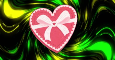Pink heart featuring white bow appearing on black creating vivid green yellow Stock Footage 315522452