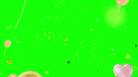 Pink heart-shaped balloon floating in green confetti-filled background for Stock Footage 345864850