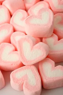 Pink heart shaped marshmallows Stock Photos