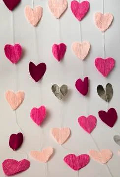 Pink hearts cut out of paper Stock Photos