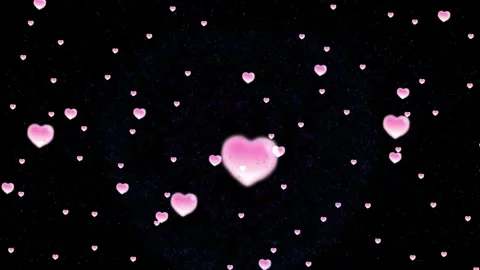 Pink hearts floating on black background. Romantic love particles for Stockbeeldmateriaal 341304372