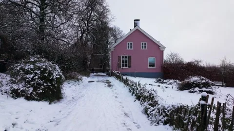 Pink House at End of Snowy Path in Oosterbeek Forest Stock Footage 327696738