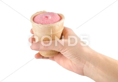 Pink ice cream in hand Stock Photos