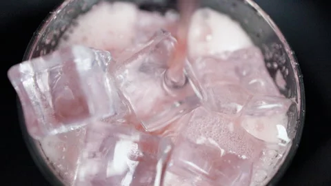 Pink Ice Cubes Closeup on Dark Background Beverage Concept Видео 340123991