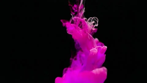 Pink ink dissolving into water abstract dynamic footage on black background Stock Footage 327572392