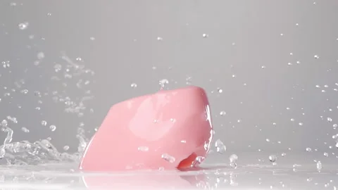 Pink jelly falling down. Сlose up slow motion. Stock Footage 143612790