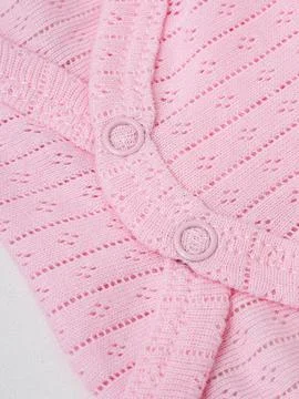 Pink knit bodysuit snap button detail Stock Photos