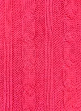 Pink knitted texture background. Pattern of wool knitting for wallpaper and an Stock Photos