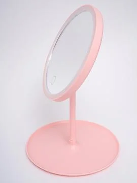 Pink led vanity mirror round view Stock Photos