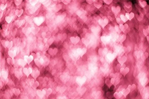 Pink lights bokeh in the form of hearts Stock Photos