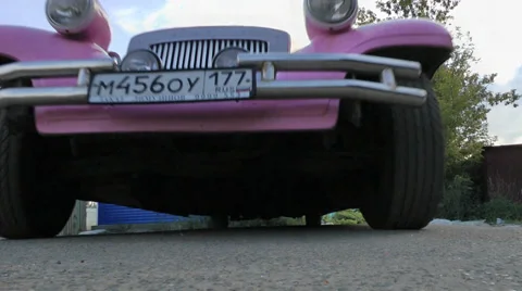 Pink limousine rides over the camera Stock-Footage 34865705