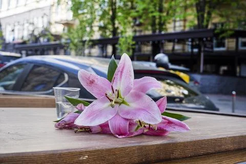 A pink line left on a table outside a cafe Stock Photos