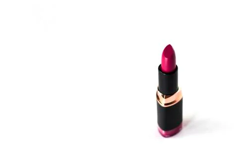 Pink lipstick without a cap in the right corner Stock Photos