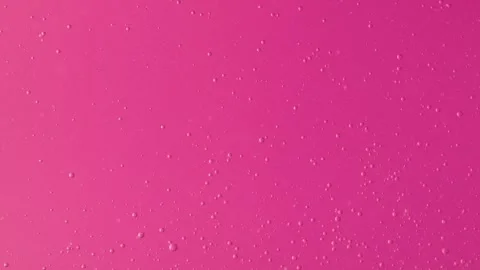 Pink Liquid with Bubbles and Foamy Surface Stock Footage 314834533