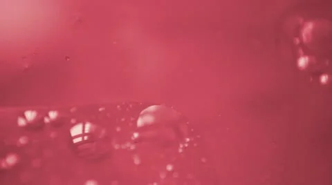 Pink liquid with bubbles Video stock 20647648