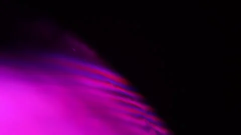 Pink liquid on dark background, bright sphere Stock Footage 291461668