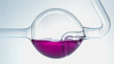  Pink liquid in glass of flask. Stock Footage 238780327