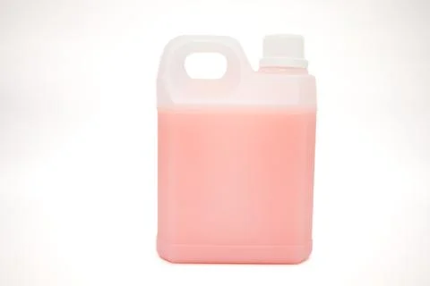 Pink Liquid in Plastic Container on White Background Ready for Usage at Hom.. Stock Photos