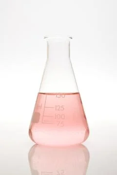 Pink liquid in a volumetric flask Stock Photos