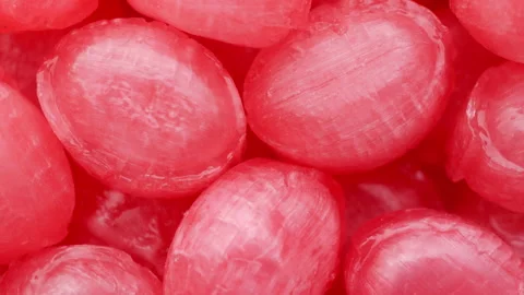 Pink lollipops, rotation in circle. Seamless loop. Stock Footage 246146983