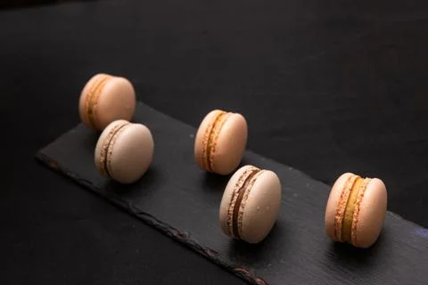 Pink macarons on the board Stock Photos