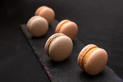 Pink macarons on the board Stock Photos