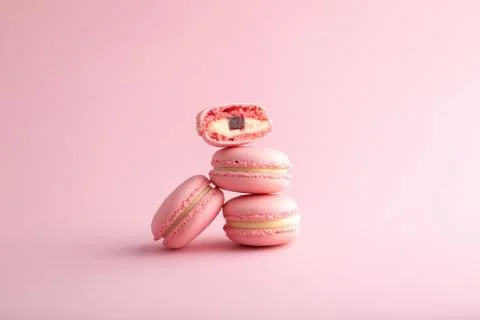 Pink macaroons macro on a pink background Stock Photos