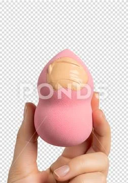 Pink makeup sponge with liquid foundation in hand, beauty blender PSD Template