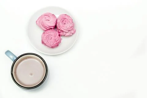 Pink marshmallow on plate, cup of coffee, Valentines Day food with copy spa.. Stock Photos