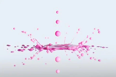 Pink milk drops on the create splash and drop column Stock Photos