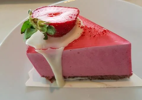 Pink mousse cake piece Stock Photos