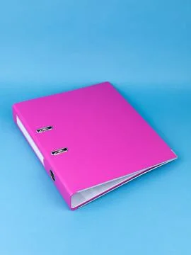 Pink  office folder on blue background. Office Folder Template Stock Photos