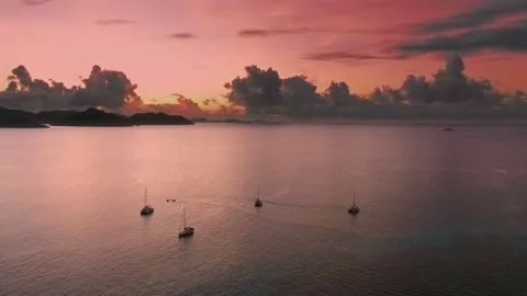 Pink-orange sunset on La Digue island, Seychelles Stock Footage 154599011