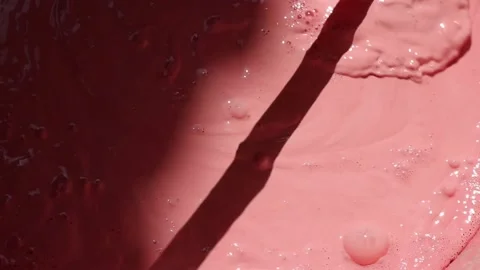 Pink paint liquid splash with bubbles. Stock Footage 161791929